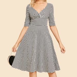 A beautiful black and white flare dress size small